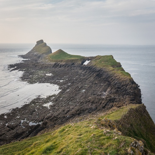 Worm’s head. Outer Head, Devil’s bridge and low neck from Inner Head. Gower, Glamorgan.